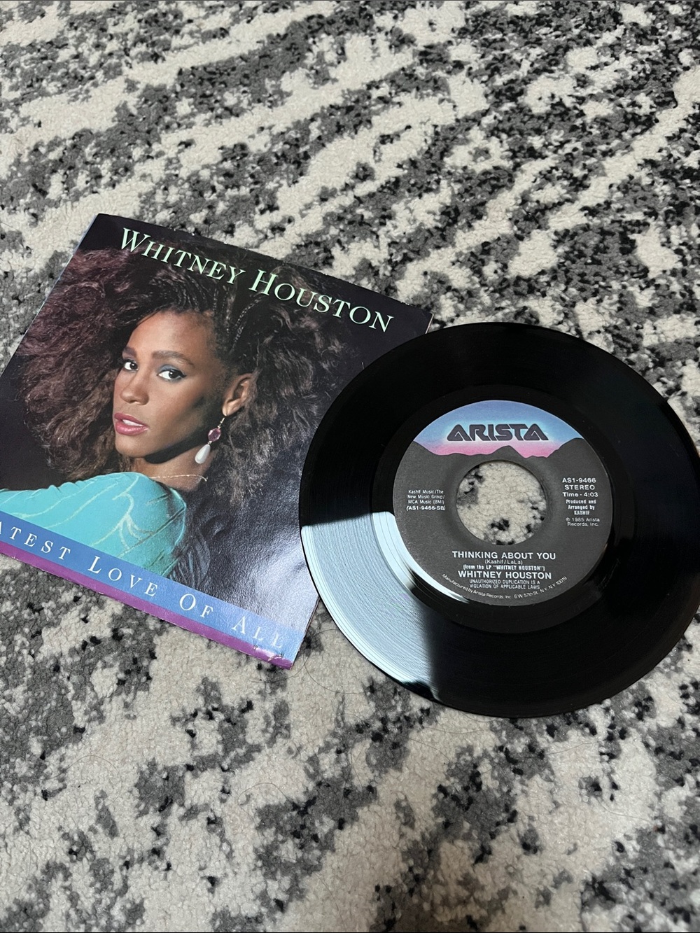 Arista Black Vinyl Single with Teal and Purple Label